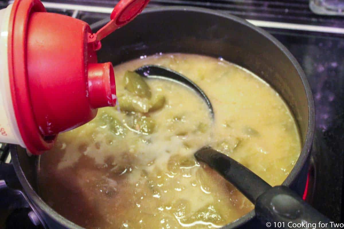 thickening liquid from crock pot in sauce pan with flour.