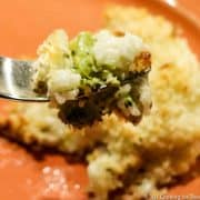 fork full of chicken broccoli and rice casserole