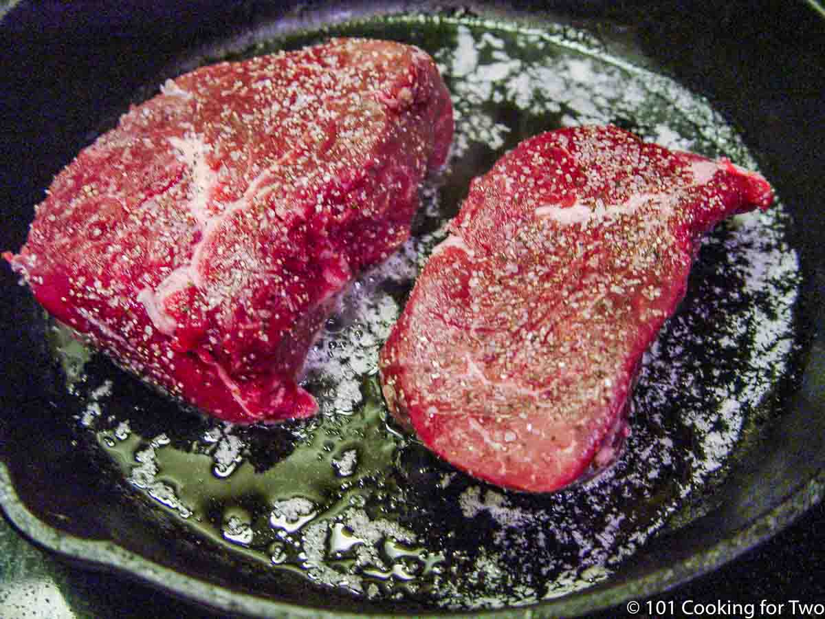 raw filets in a skillet