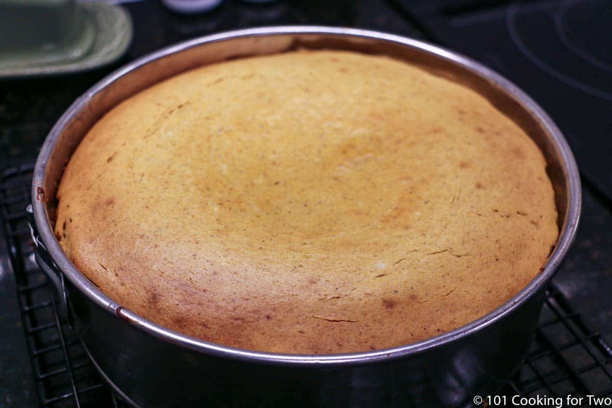 cooked pumplkin cheese cake in pan.