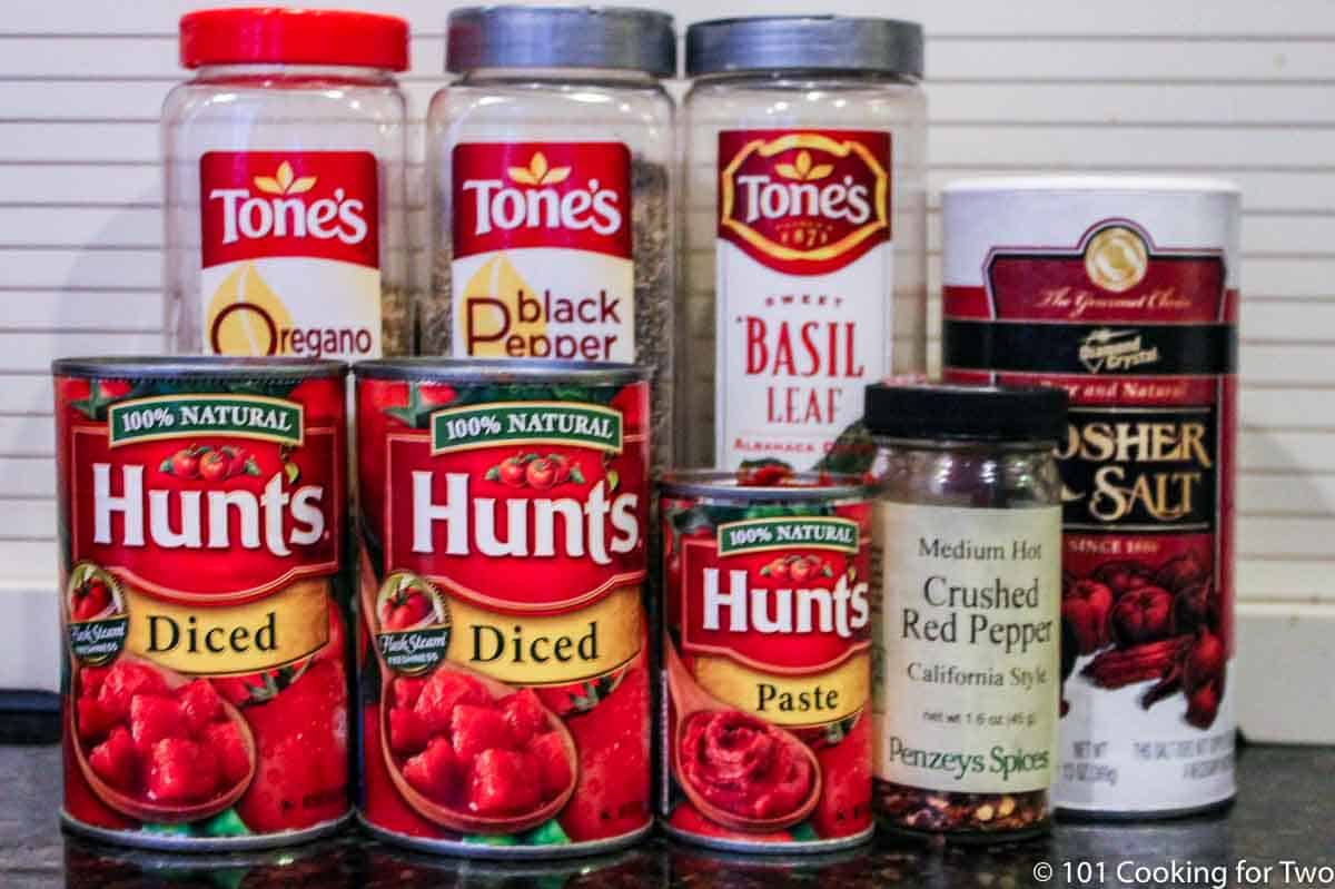 canned tomatoes and spices for sauce