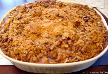 cooked sweet potato casserole in white dish