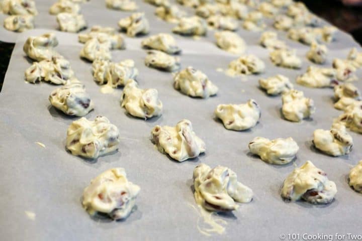 almond clusters cooking on parchment paper