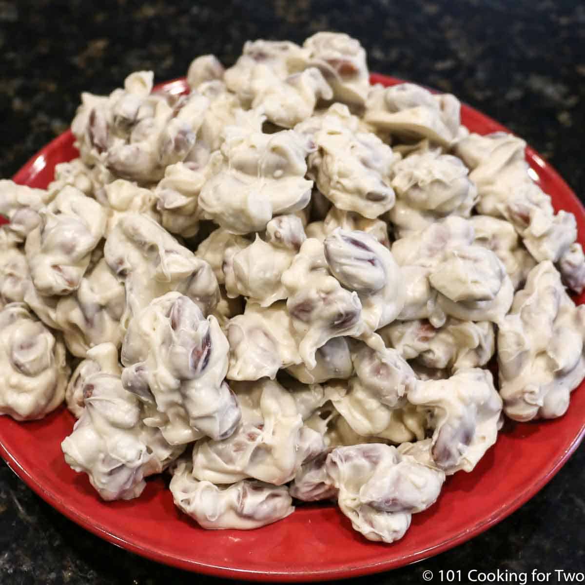 almond clusters on a red plate