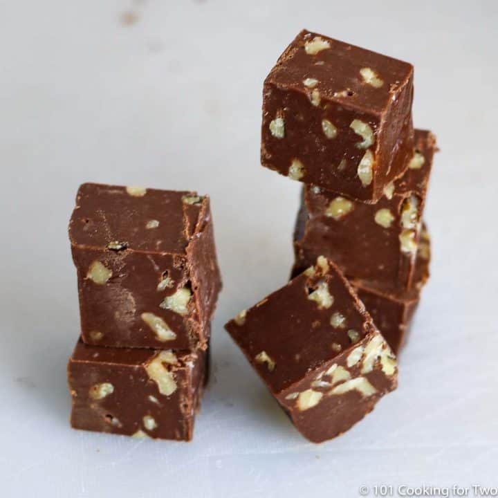 cubes of fudge with nuts in a tower