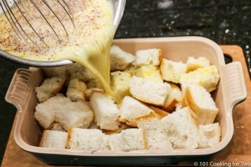pouring batter over bread cubes
