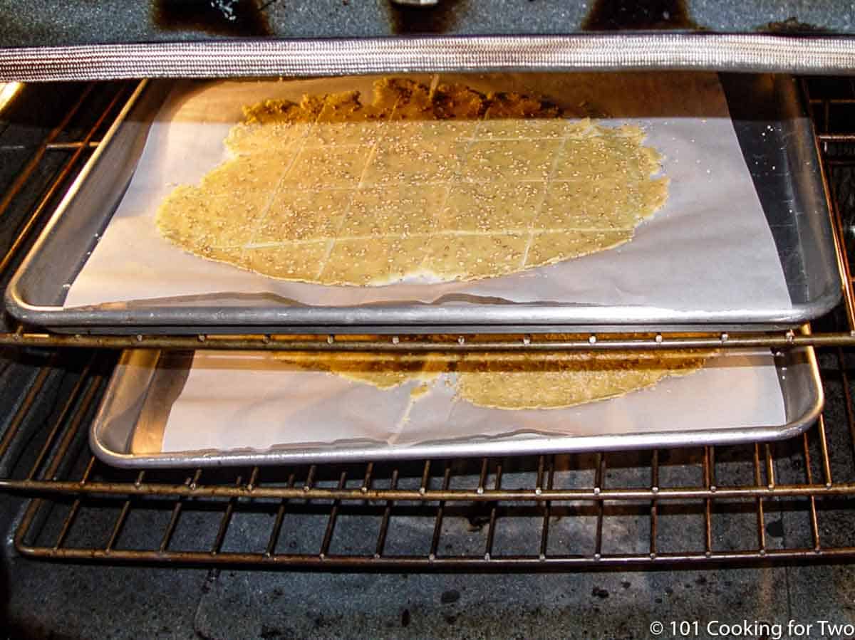 baking two trays of crackers in the oven
