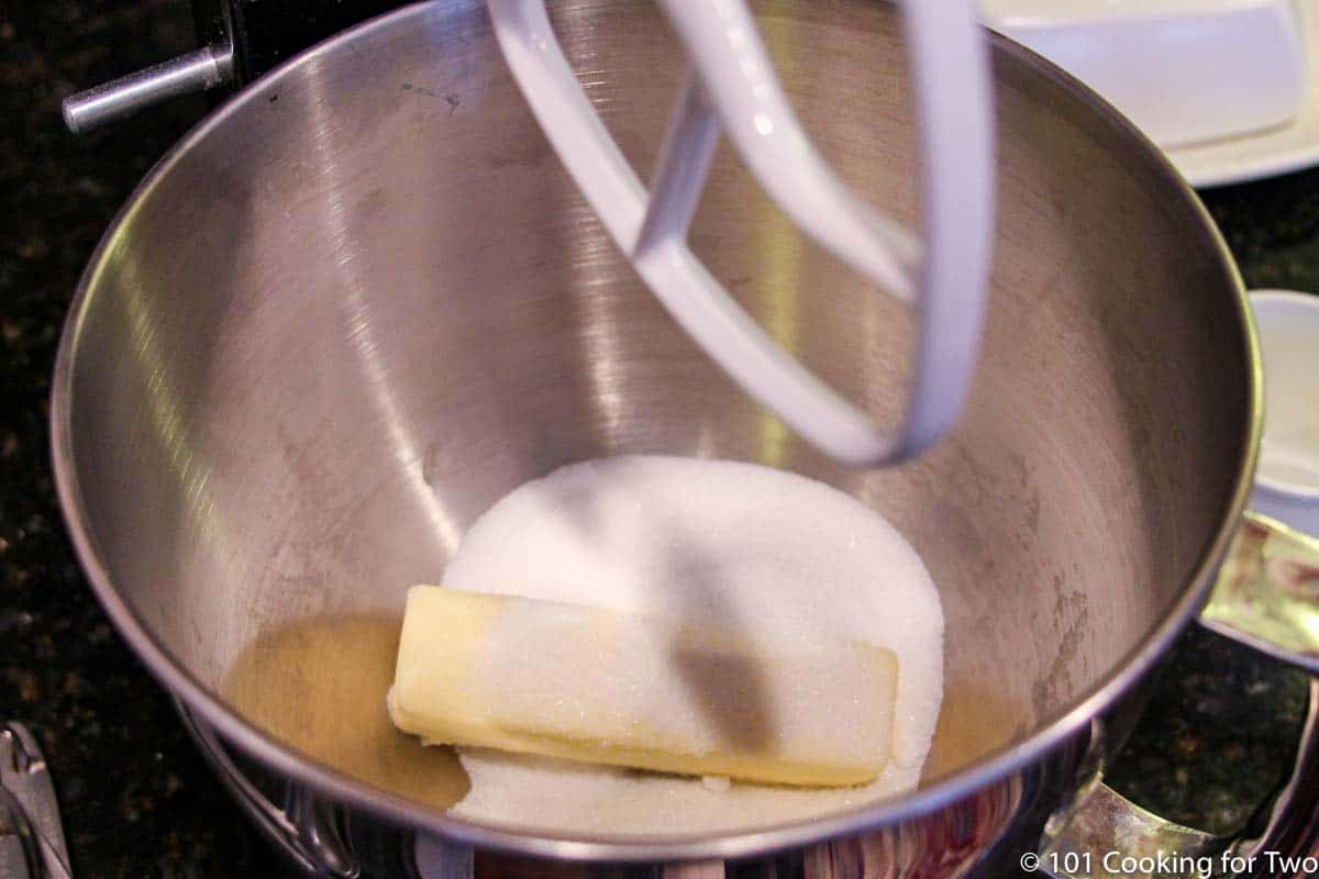 butter with sugar and spices on stand mixer.