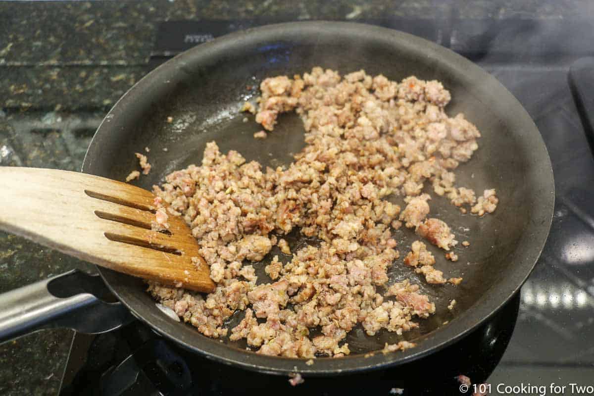 browning sausage in a skillet.