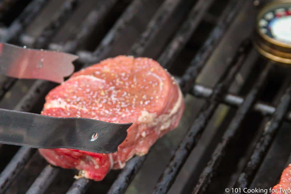 placing a filet over direct heat on the grill