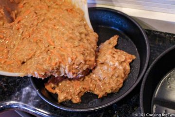 adding the batter into the prepared pans