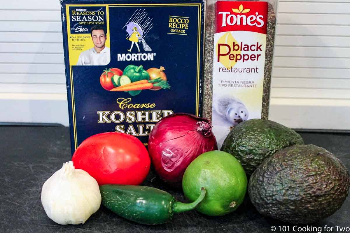 avacodos and other ingredients for guacamole.
