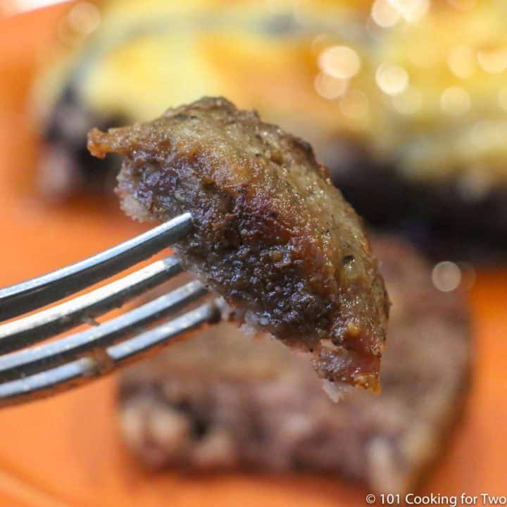 bite of sausage on a fork