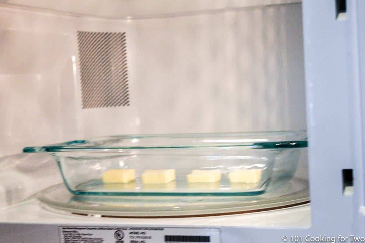 butter in a glass bowl in the microwave.