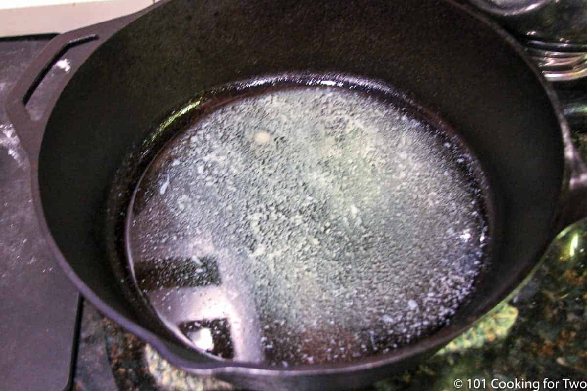 melted butter in a large frying pan.