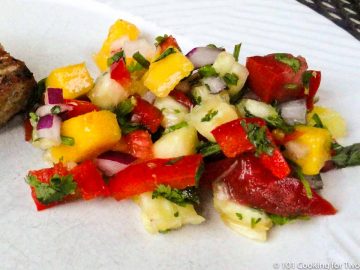 Mango Pineapple Salsa on a white plate wide view