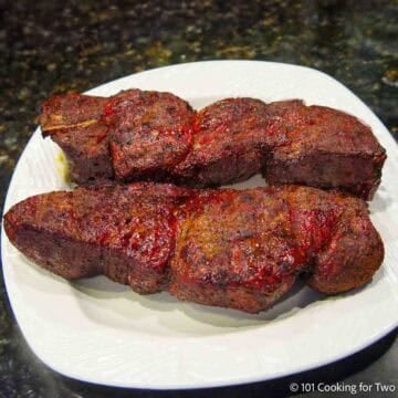 BBQ bone-in country pork ribs on a plate.