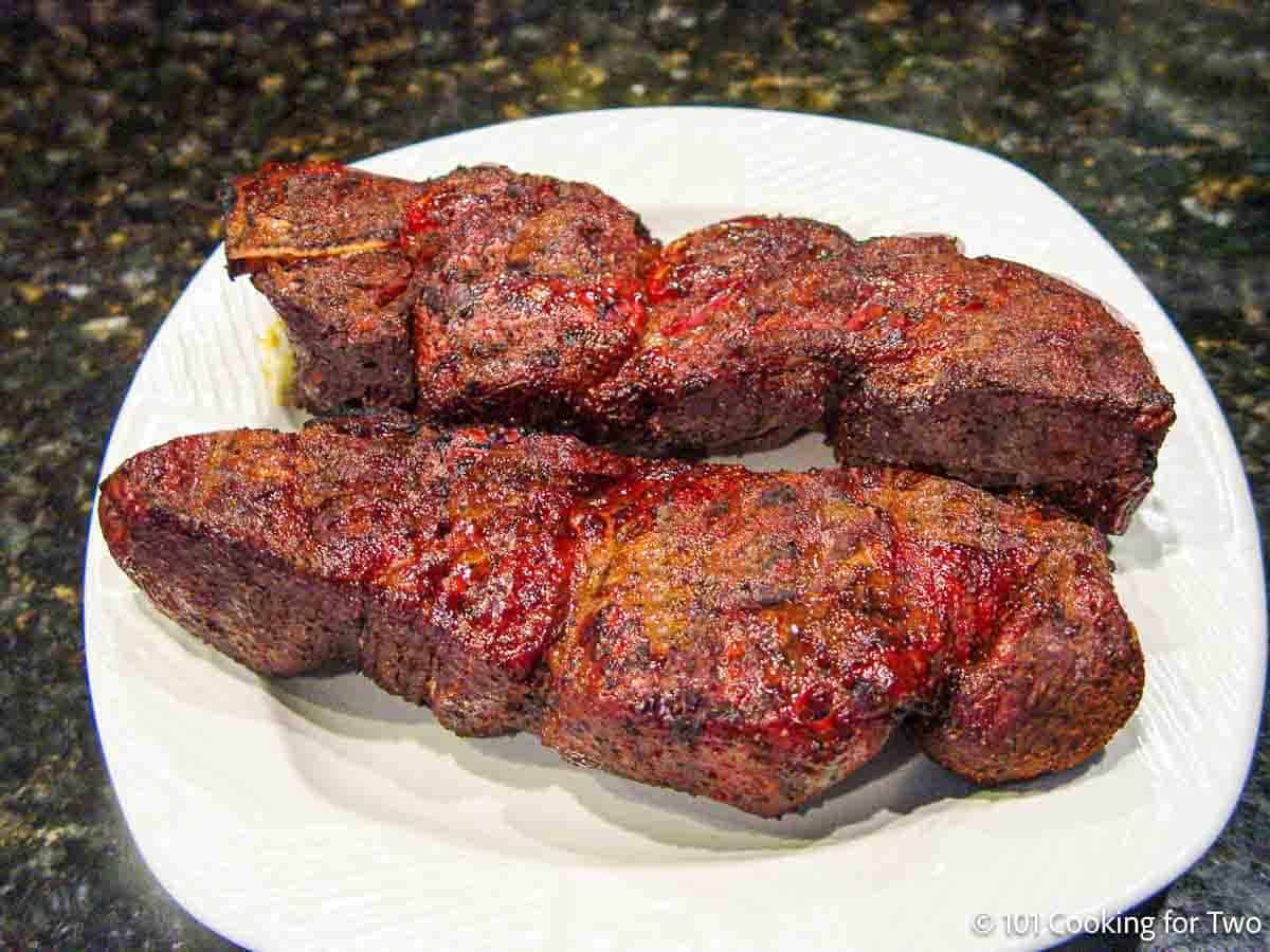 Bone-in country pork ribs on a plate.