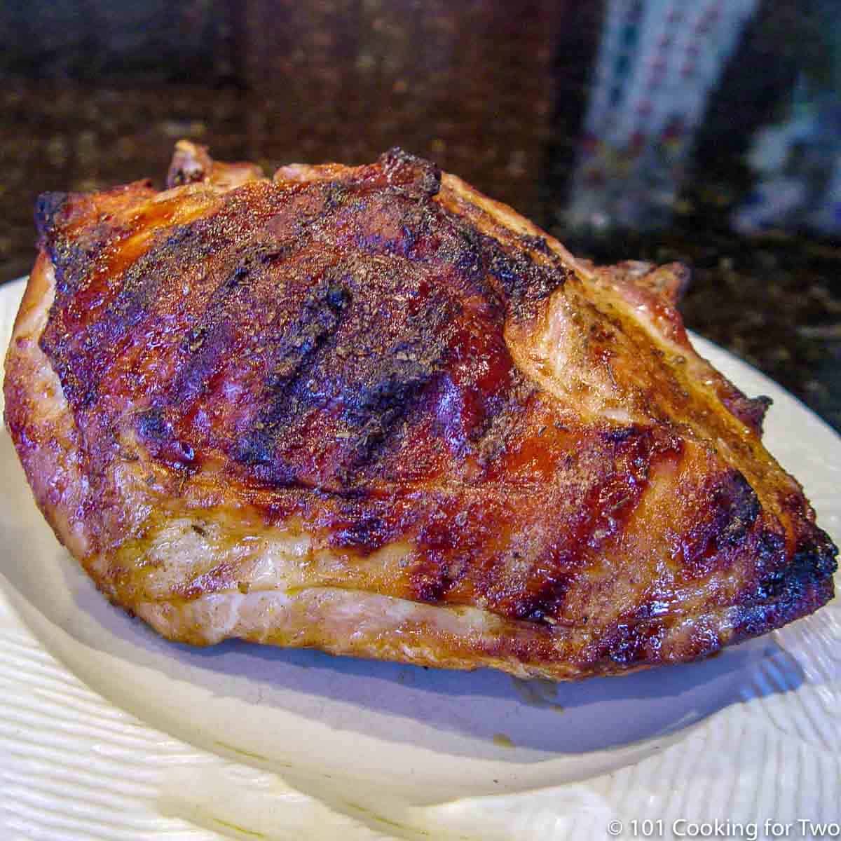 grilled turkey breast on a white plate