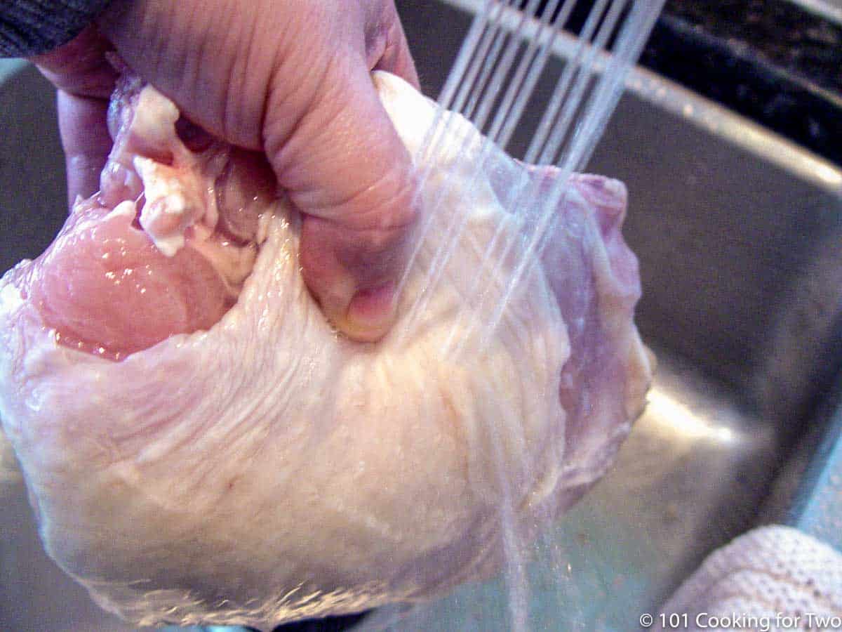 rinsing brine off the turkey
