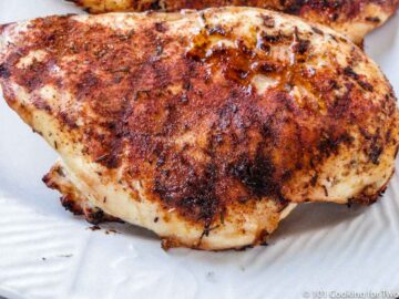 blackened chicken breast on a white plate