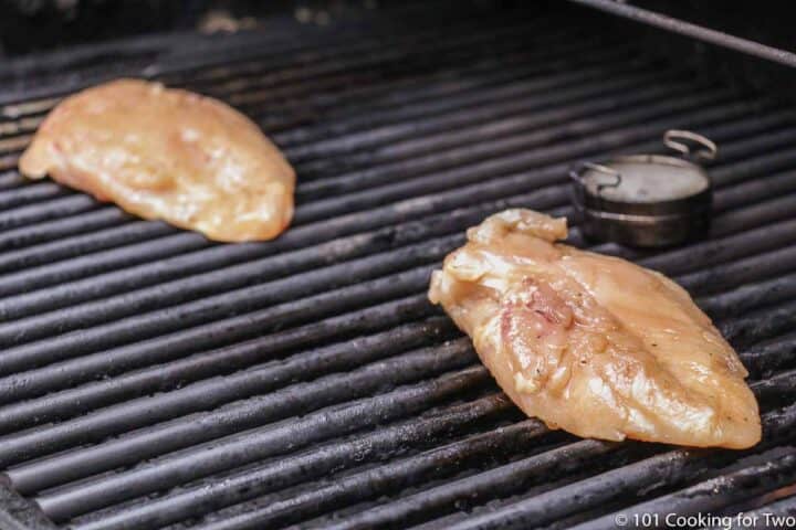 glazed chicken breasts on the grill.