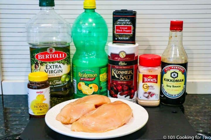 raw chicken with honey glaze ingredients.