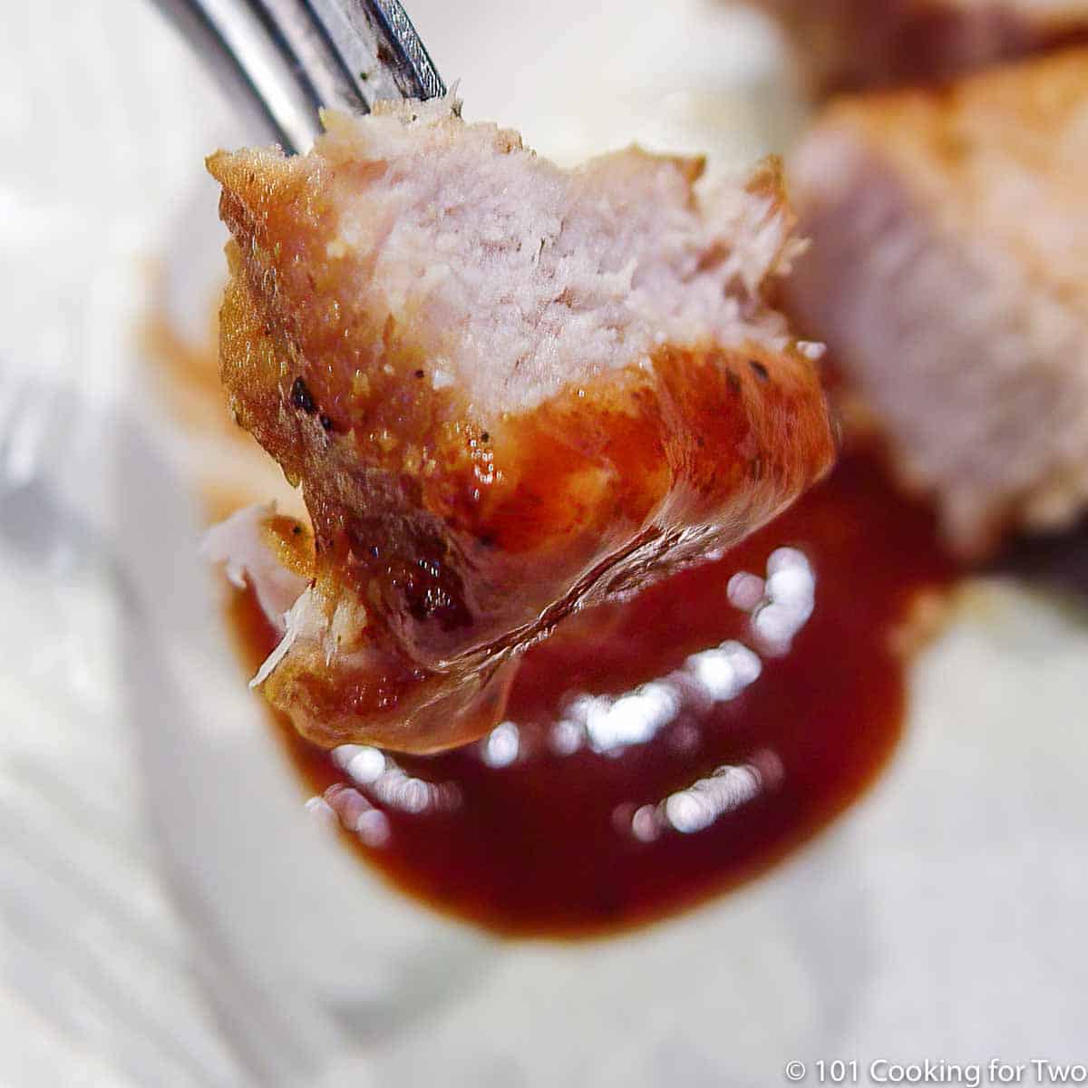 boneless pork rib bite on a fork.