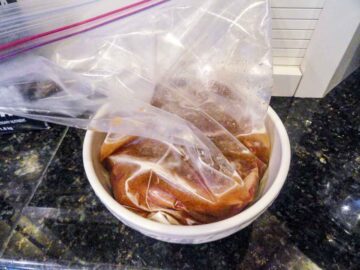 sirloin steak in bag of marinade.