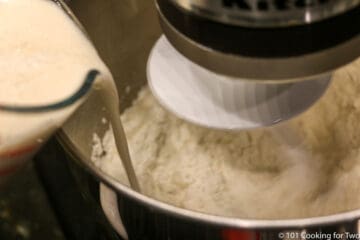 adding yeast to the stand mixer