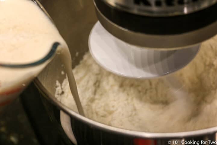 adding yeast to the stand mixer