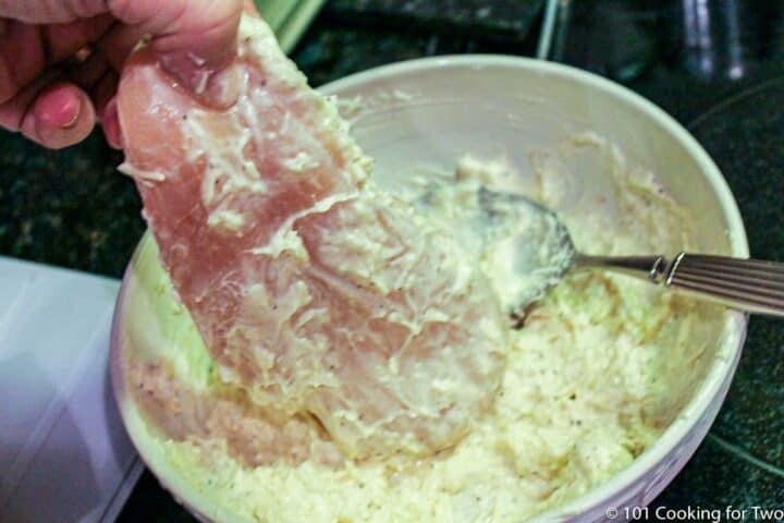 coating a chicken breast with mayo mixture