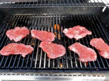 flattened pork tenderloin on a gas grill