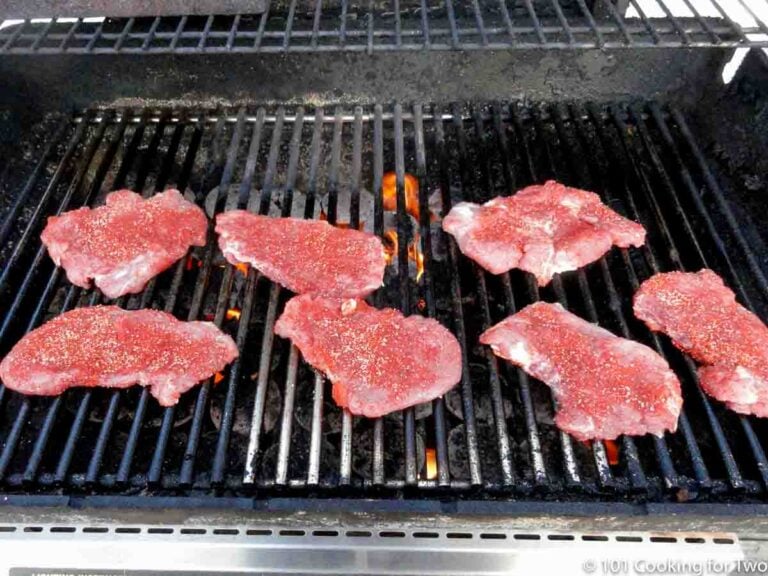 flattened pork tenderloin on a gas grill