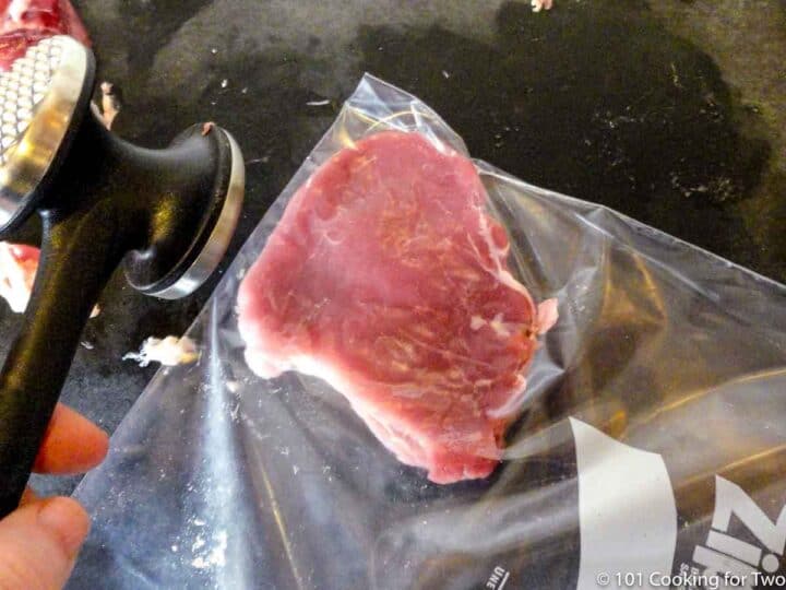 flattening pork tenderloin with a meat mallet