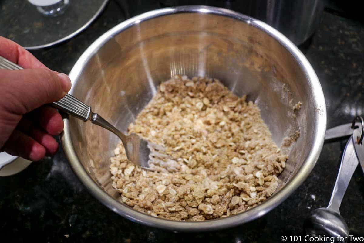 mixing oats into topping