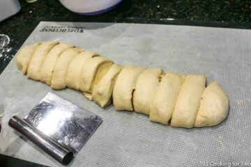 the dough in a roll and cut into 12 pieces