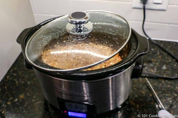 turn the lid of the crock pot sideways to vent