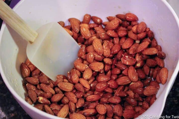 mixing almonds into egg coating