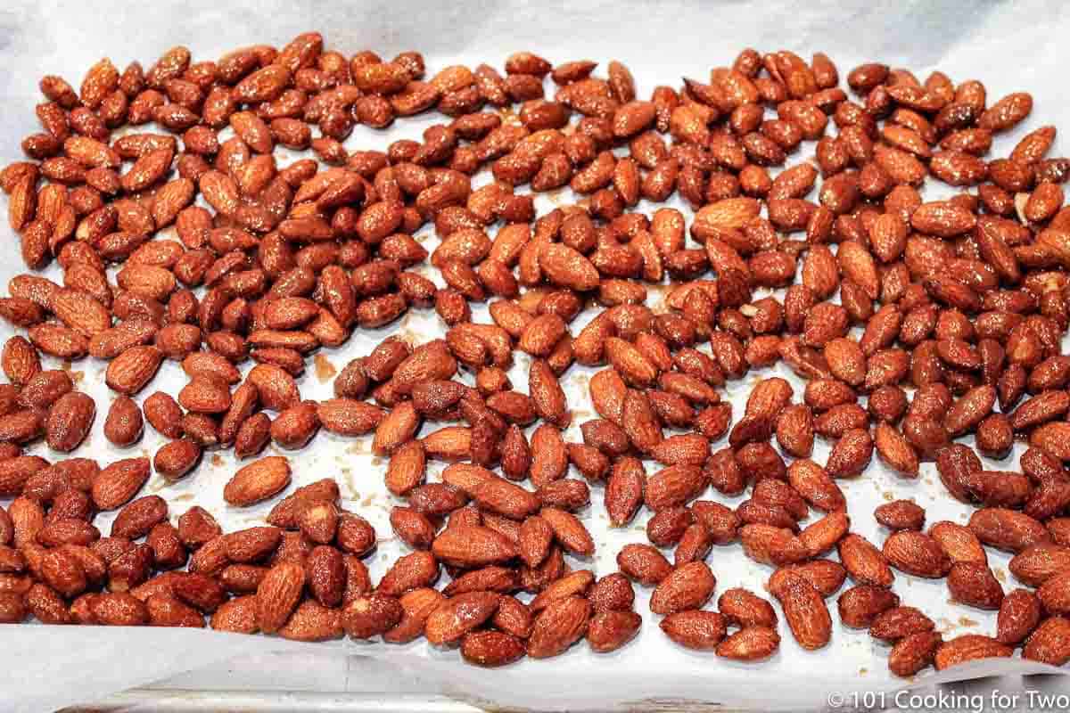 spread the almonds over a parchment cover baking tray.