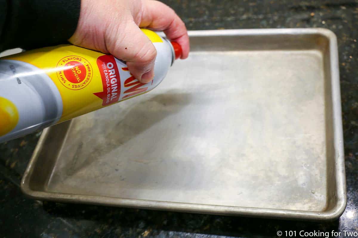 Spray baking tray with PAM.