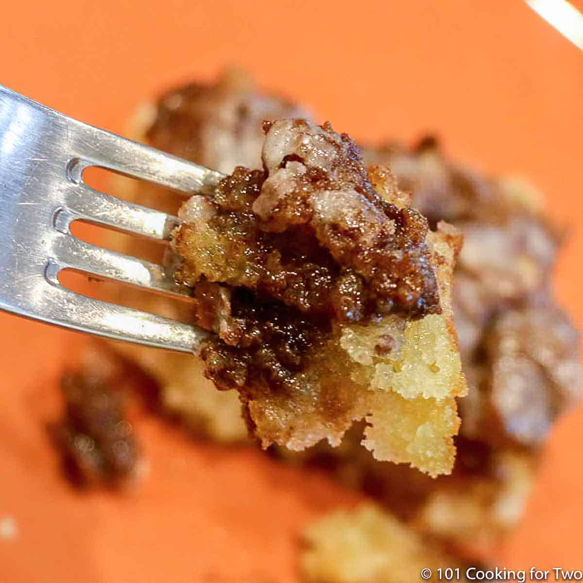 cinnamon roll cake on a fork.