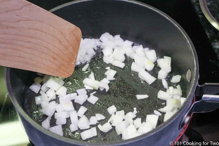 cooking onion in a sauce pan