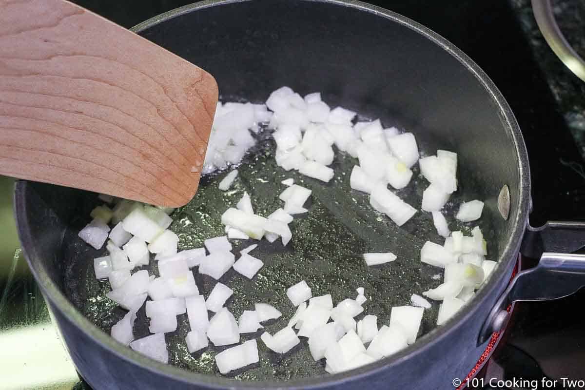 cooking onion in a sauce pan.