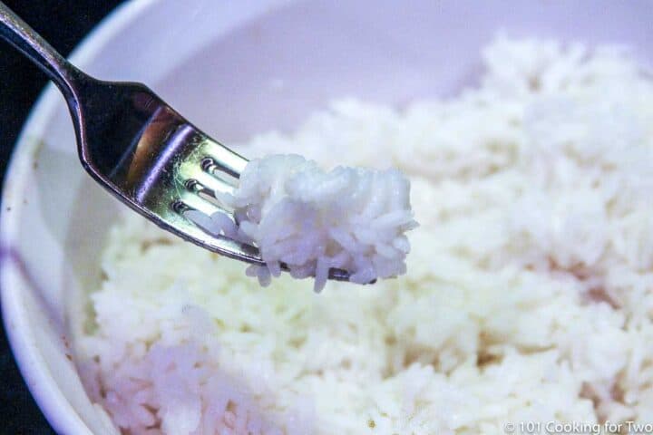 fluffing rice in the bowl