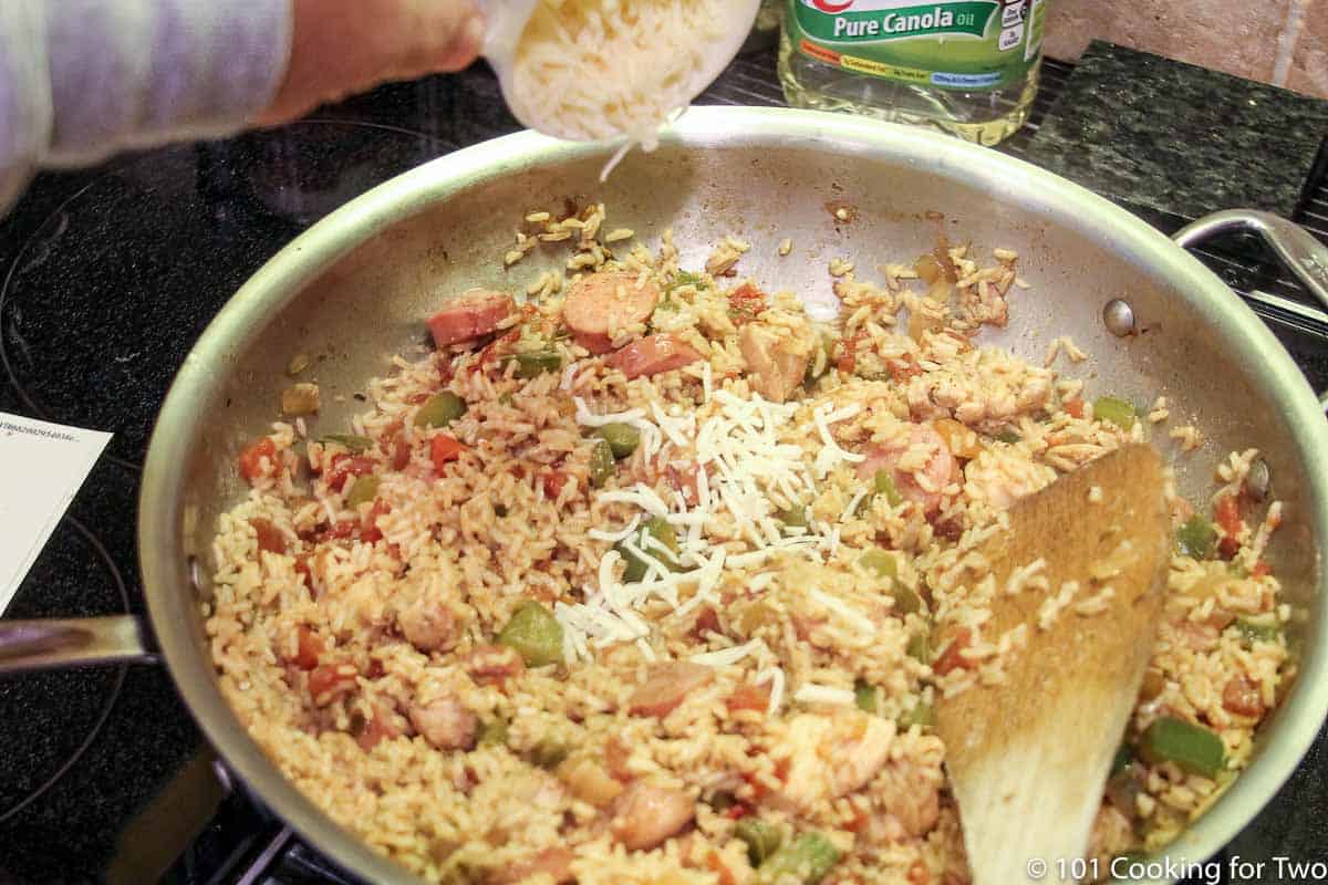 mixing cheese into casserole