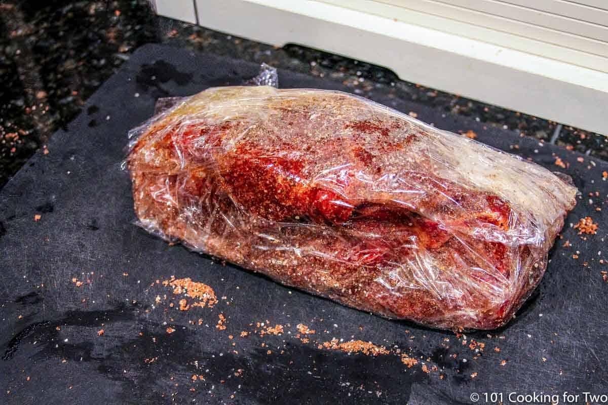pork butt wrapped in plastic wrap