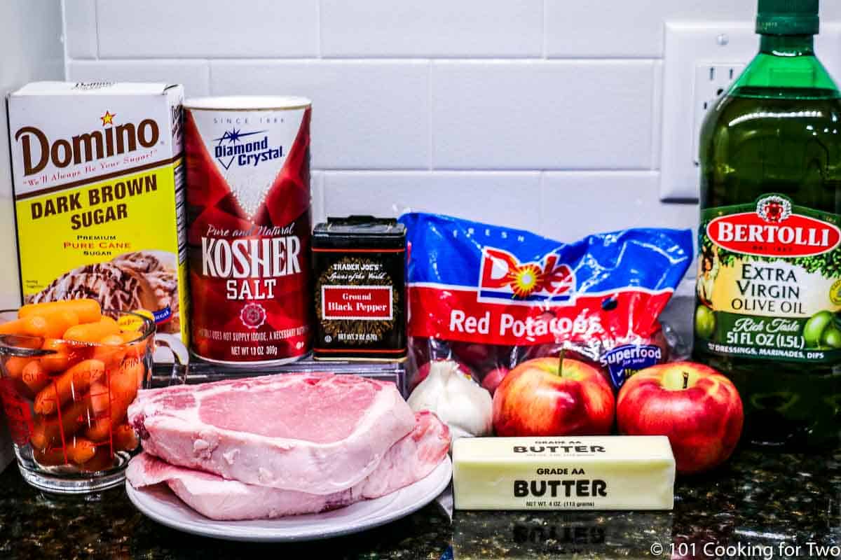 pork chops with apples and seasoning.