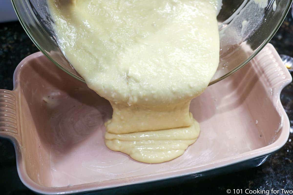 pouring batter into baking dish