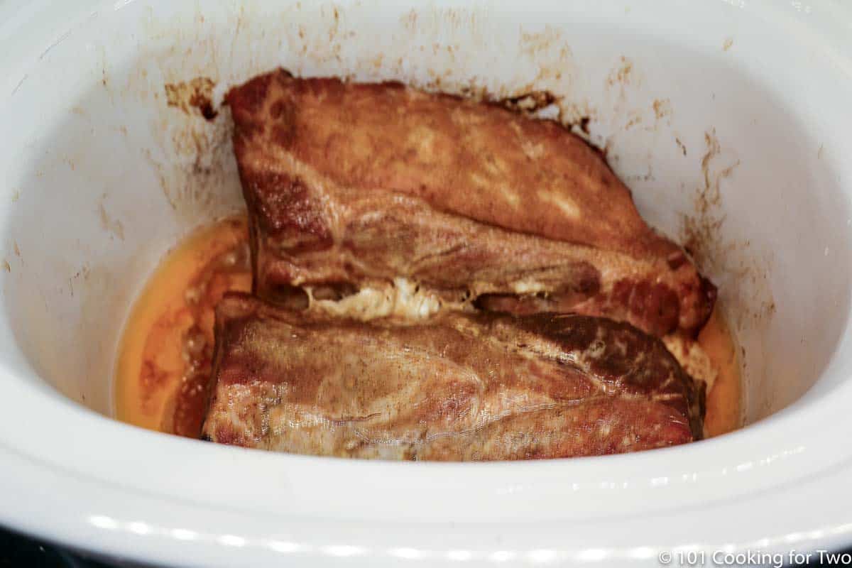cooked ribs still in the crock pot